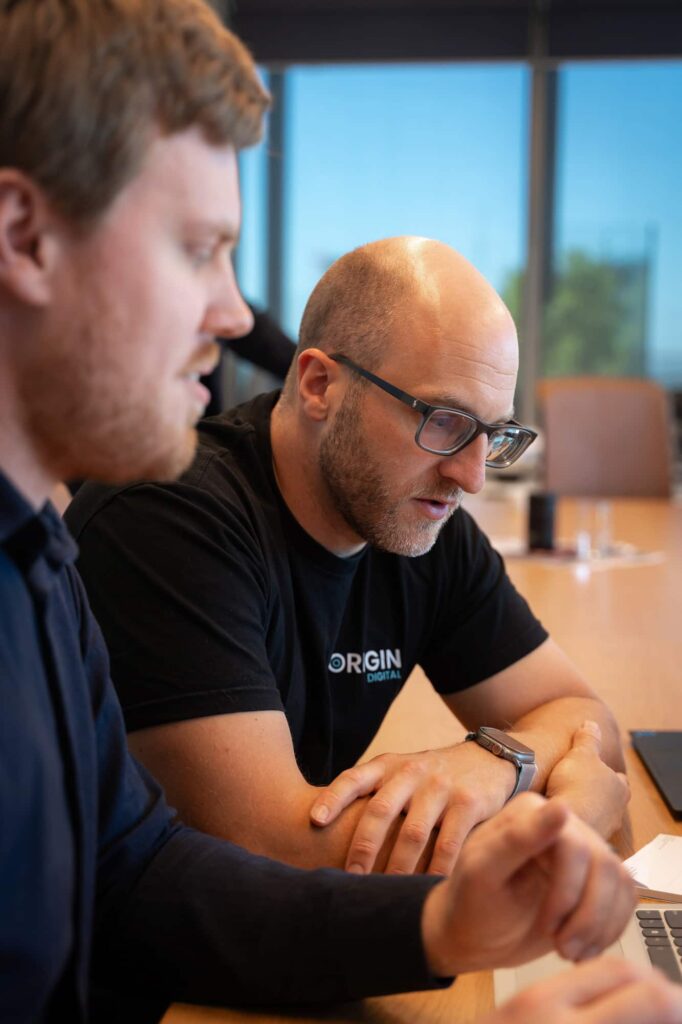 Dev team exploring benefits of custom software